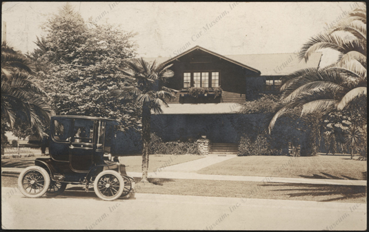 Real Photo Post Card image of an unidentified electric car, front 
